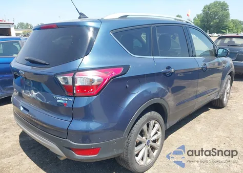 2018 Ford Escape Titanium z USA, uszkodzony, nr VIN 1FMCU9J93JUC80098